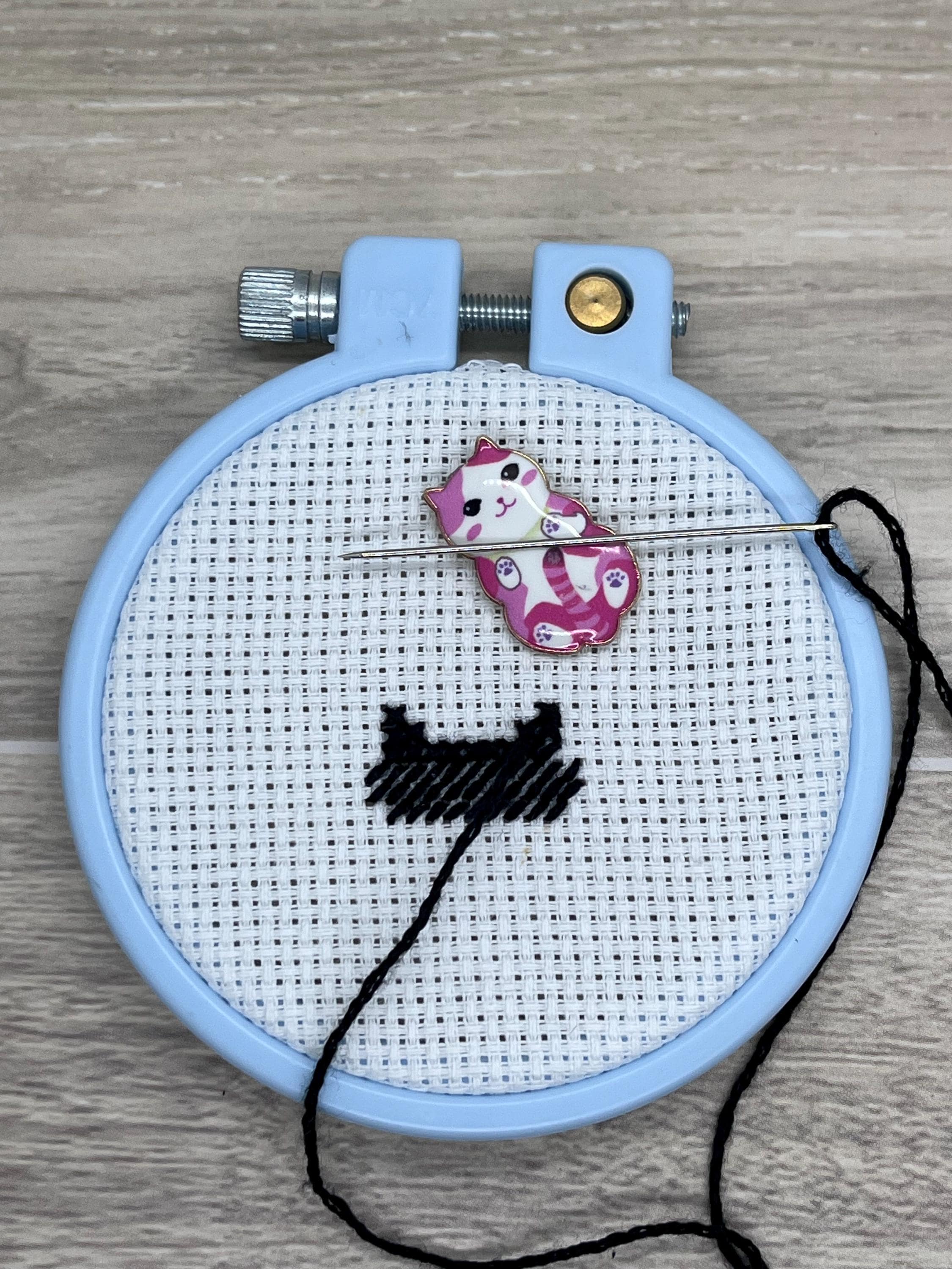 Cat Needle Minders
